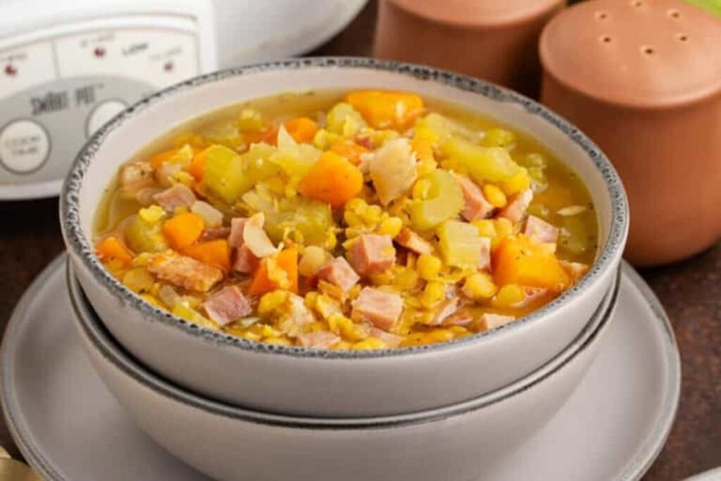 Crockpot split pea soup with bacon in a bowl.