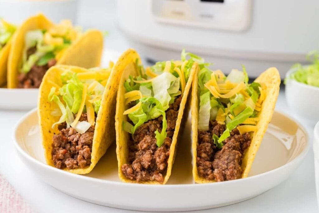 Crockpot taco meat served on a plate.