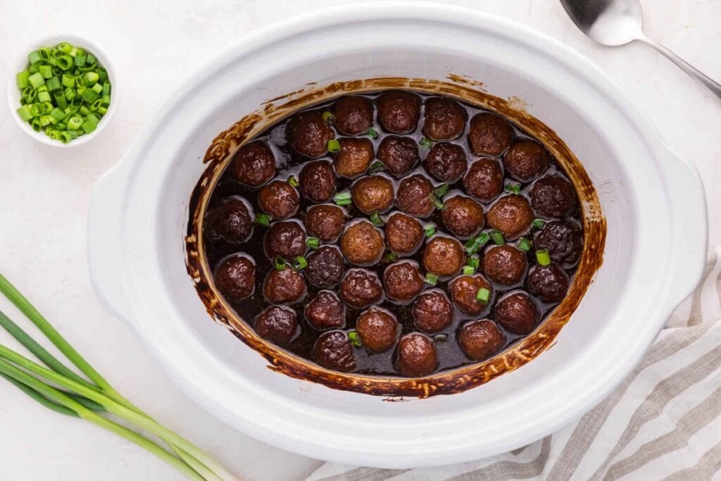 Grape jelly meatballs in a crock pot.