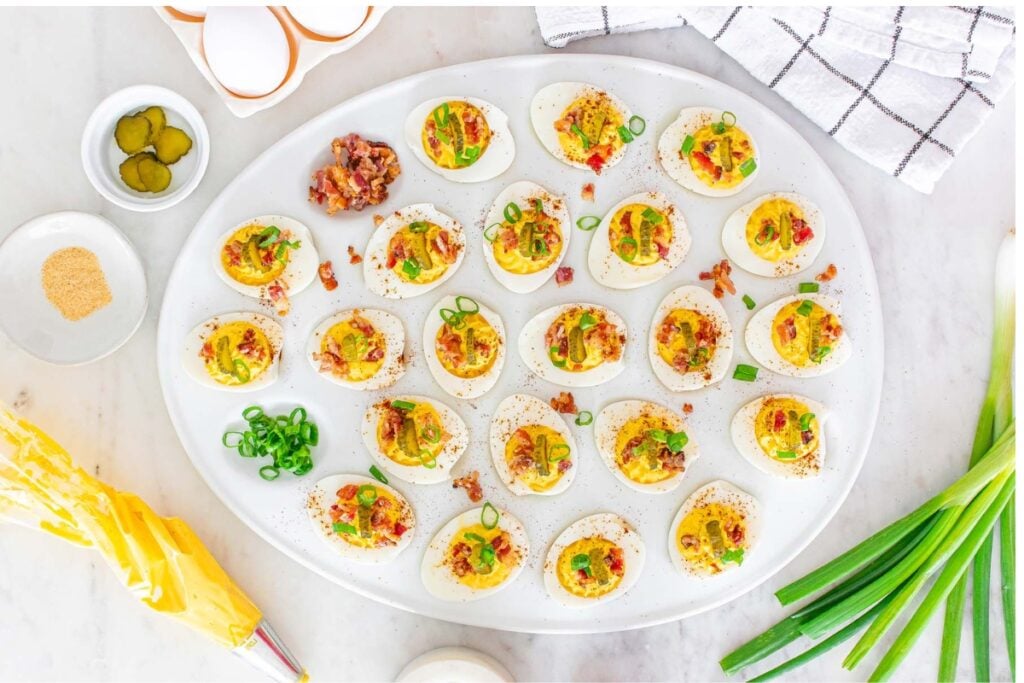 Million dollar deviled eggs on a plate.