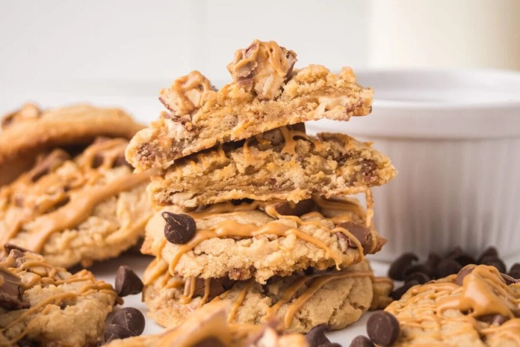 Stack of peanut butter snickers cookies.
