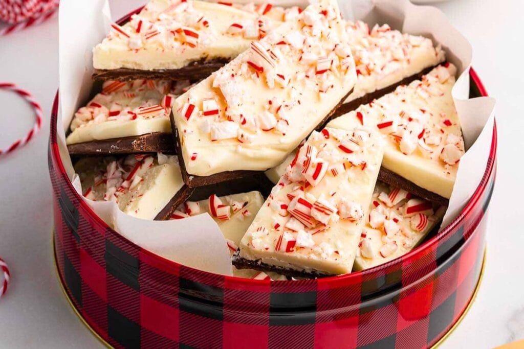 Peppermint bark in a red plaid gift tin