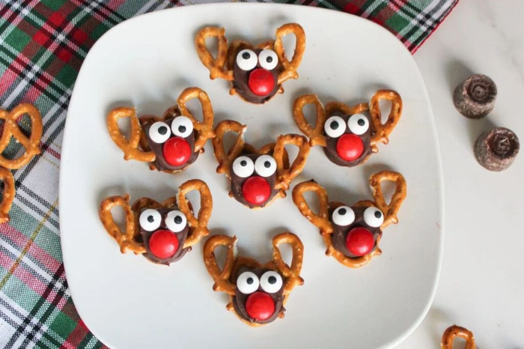 Reindeer rolo pretzels on white dish.