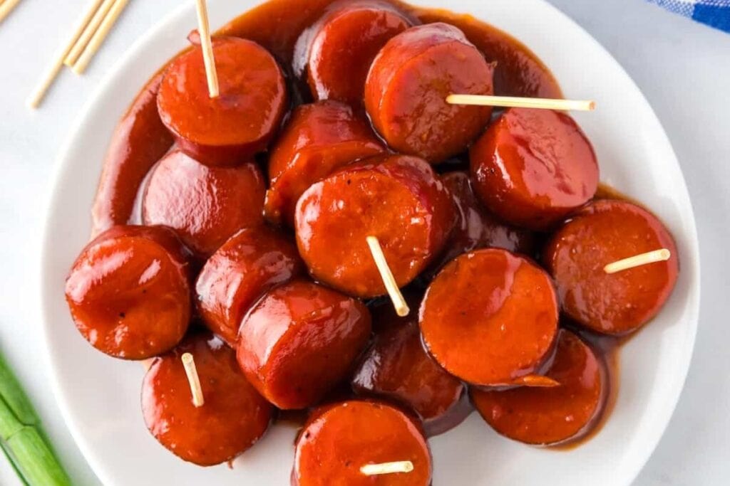 Slow cooker kielbasa bites on a plate.