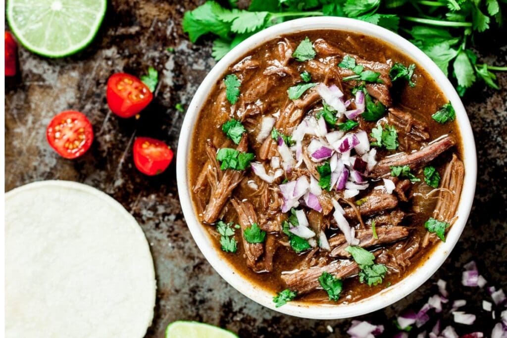 Slow cooker mexican shredded beef in a bowl.