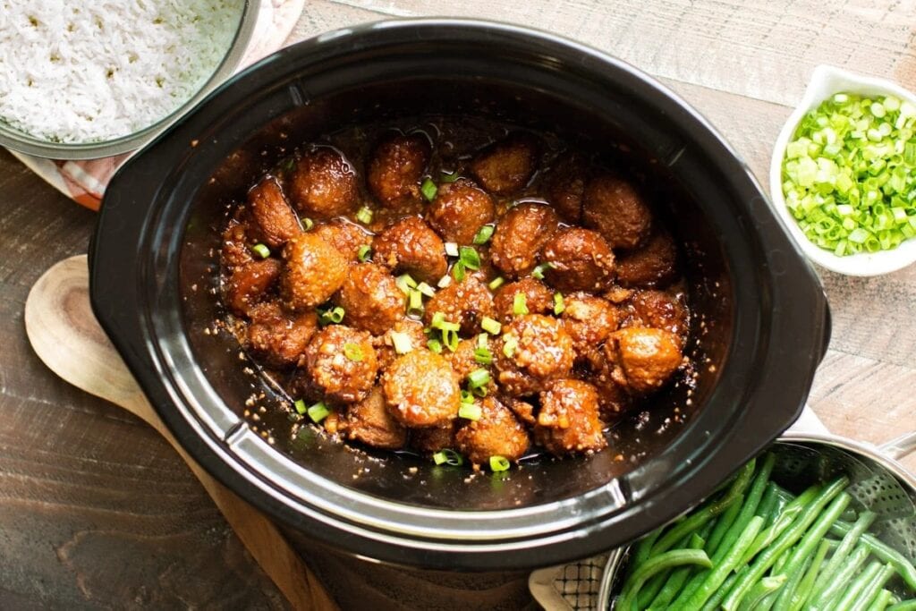 Teriyaki meatballs in a crockpot.