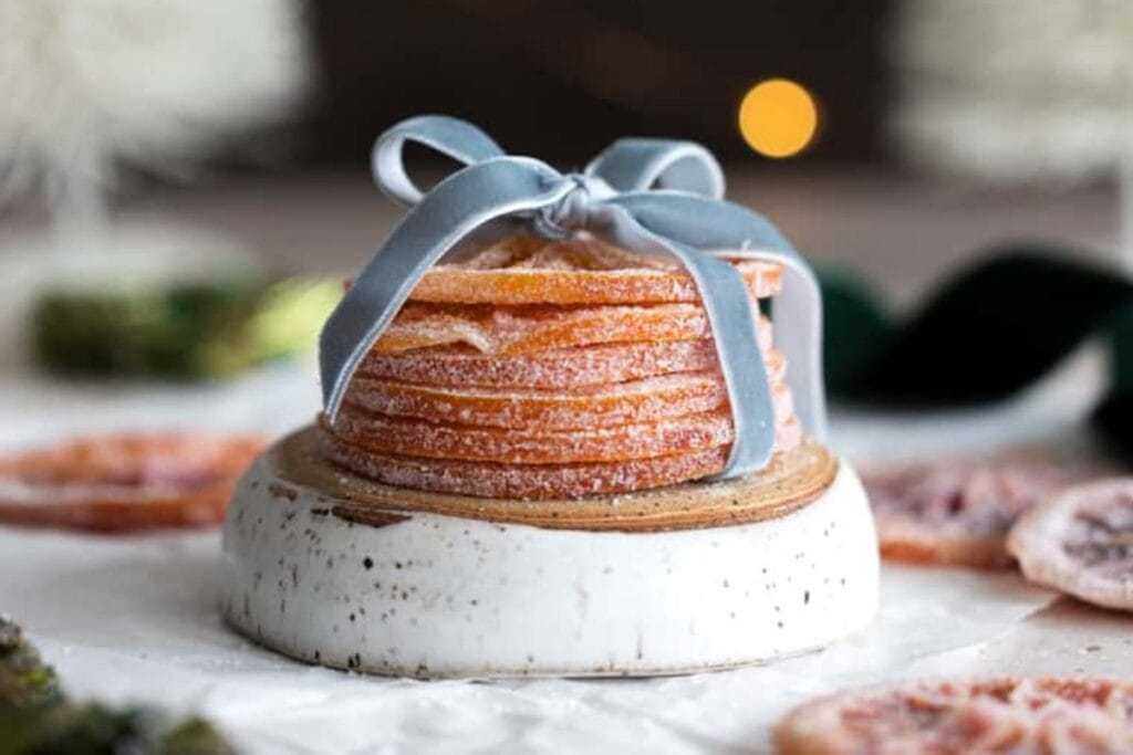 A close up shot of candied orange slices.