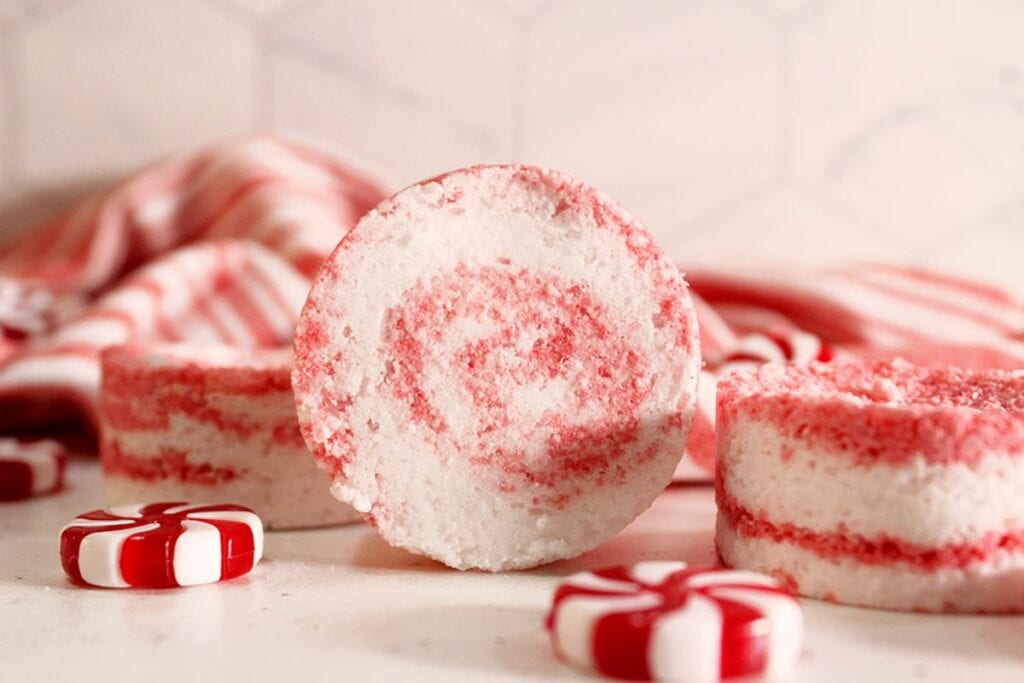A close up shot of candy cane bath bombs.