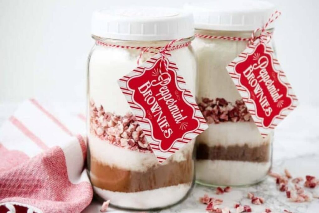 A close up shot of peppermint brownie mix in a jar.