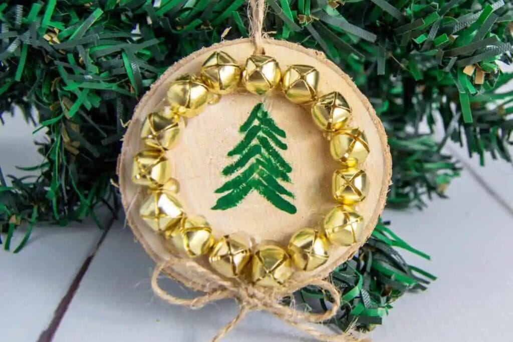 A close up shot of rustic wood slice tree ornaments.