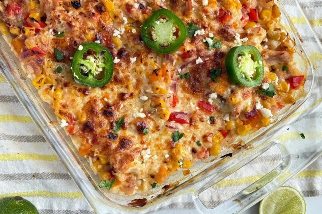 Corn casserole with chicken, peppers, cheese, jalape&ntilde;os, and cilantro.