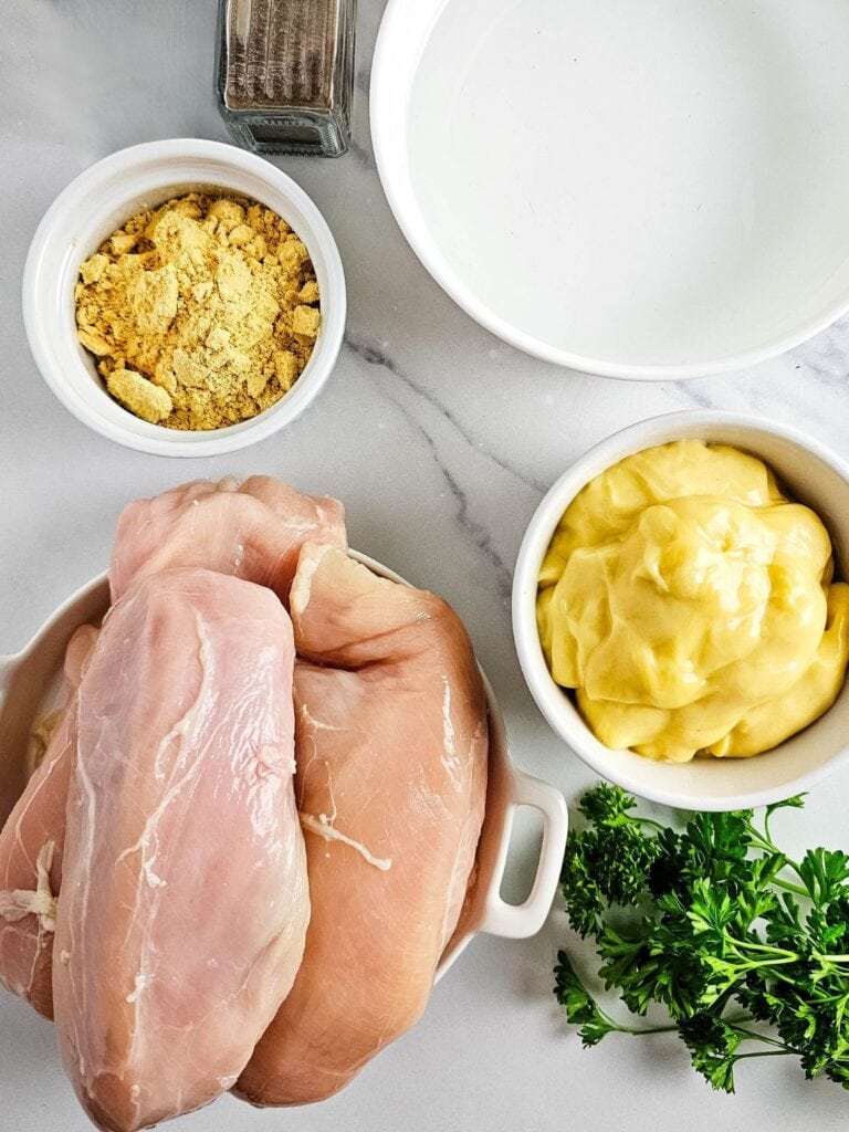Ingredients for crockpot chicken and gravy arranged on a counter.