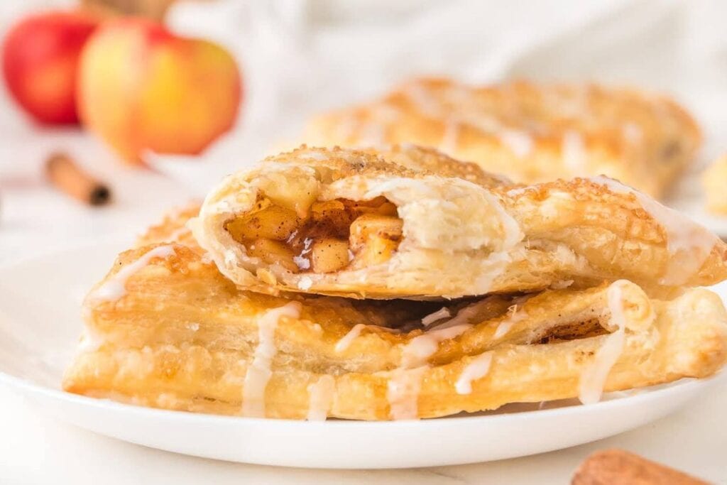 A close up shot of apple turnovers.