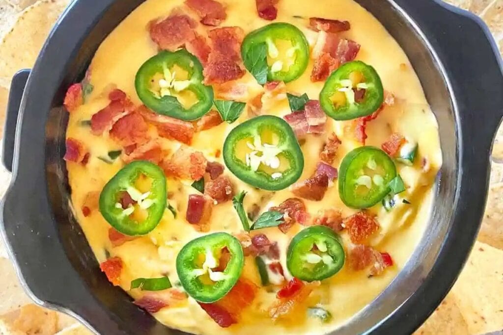 A close up shot of best bacon jalapeno popper dip.