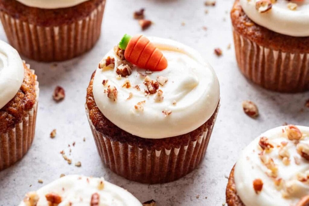 A close up shot of carrot cake cupcakes.