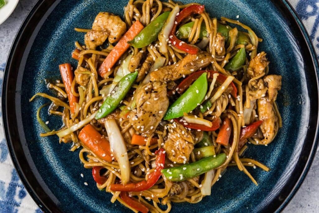 A close up shot of chicken lo mein.