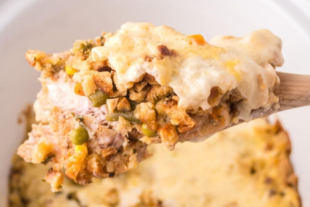 A close up shot of chicken and stuffing casserole.