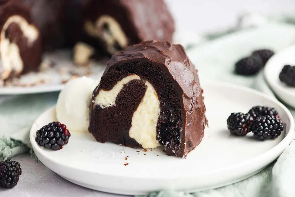 A close up shot of Chocolate bundt Cake with Cream Cheese Filling.