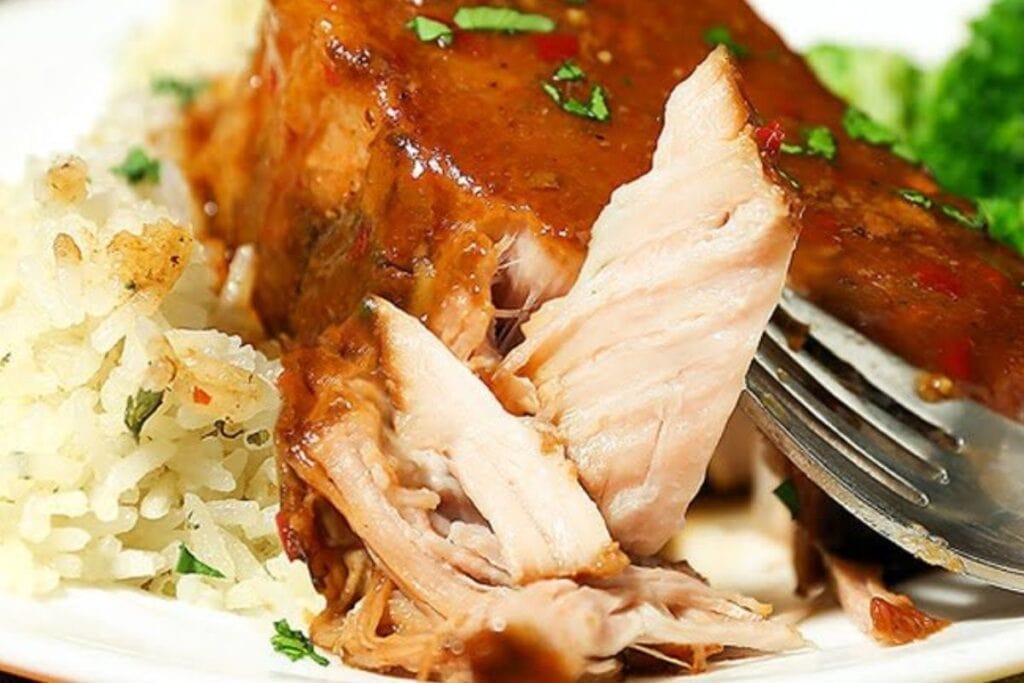 A close up shot of easy crock pot pork chops gravy.