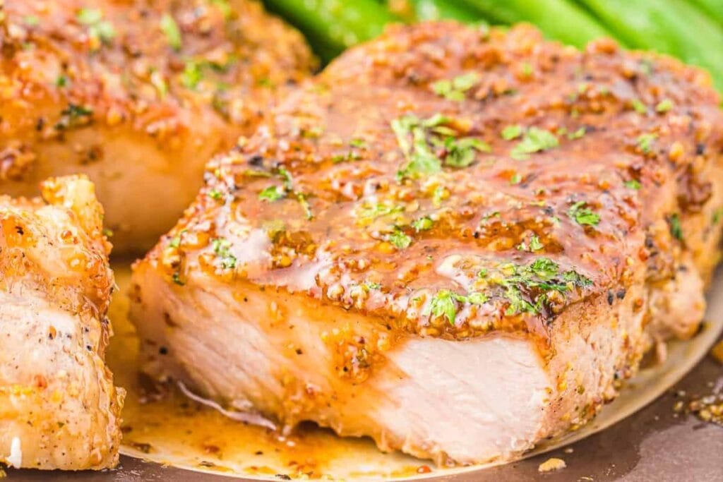 A close up shot of hone mustard pork chops.