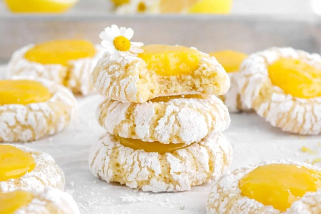 A close up shot of lemon curd thumbprint cookies.