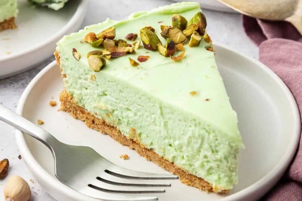 A close up shot of no bake pistachio cheesecake.