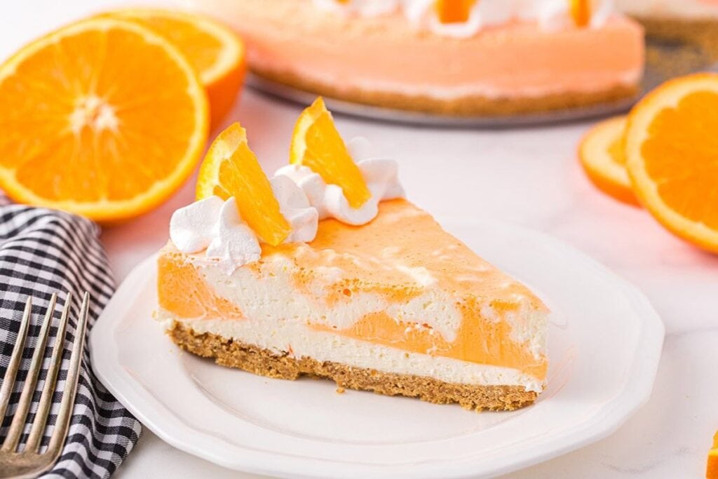 A close up shot of Orange Creamsicle Cheesecake.