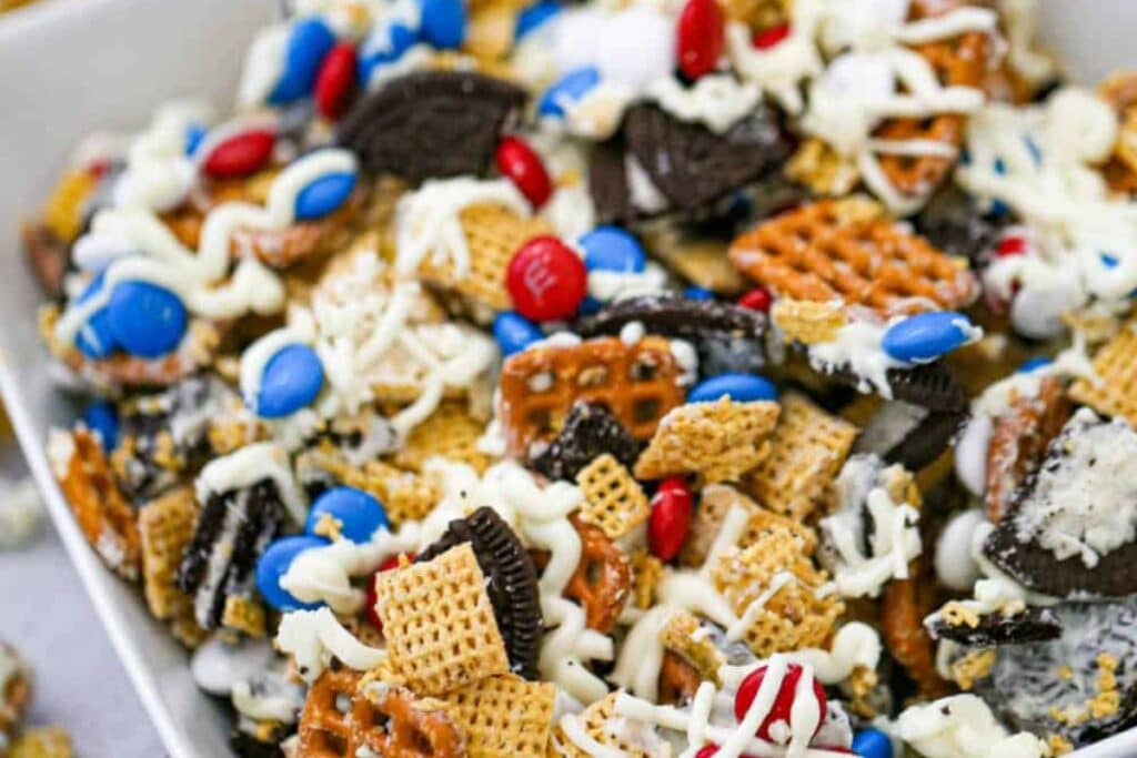A close up shot of Patriotic chex party mix.