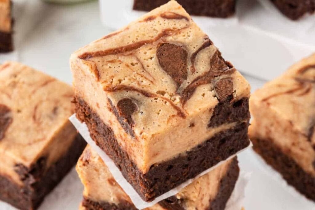 A close up shot of Peanut Butter Cheesecake Brownies.