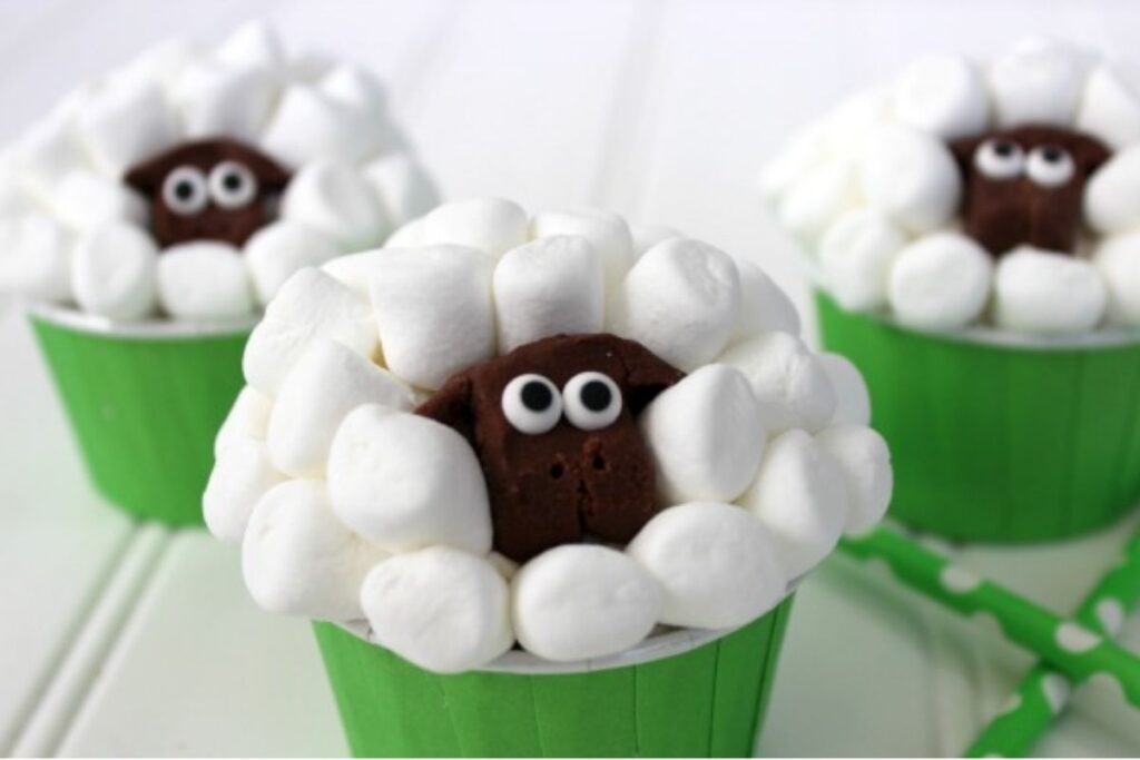 A close up shot of sheep cupcakes.