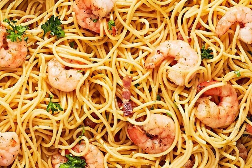 A close up shot of shrimp carbonara.