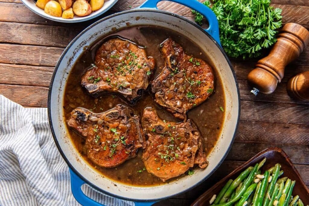 A close up shot of Skillet Braised Pork Chops.
