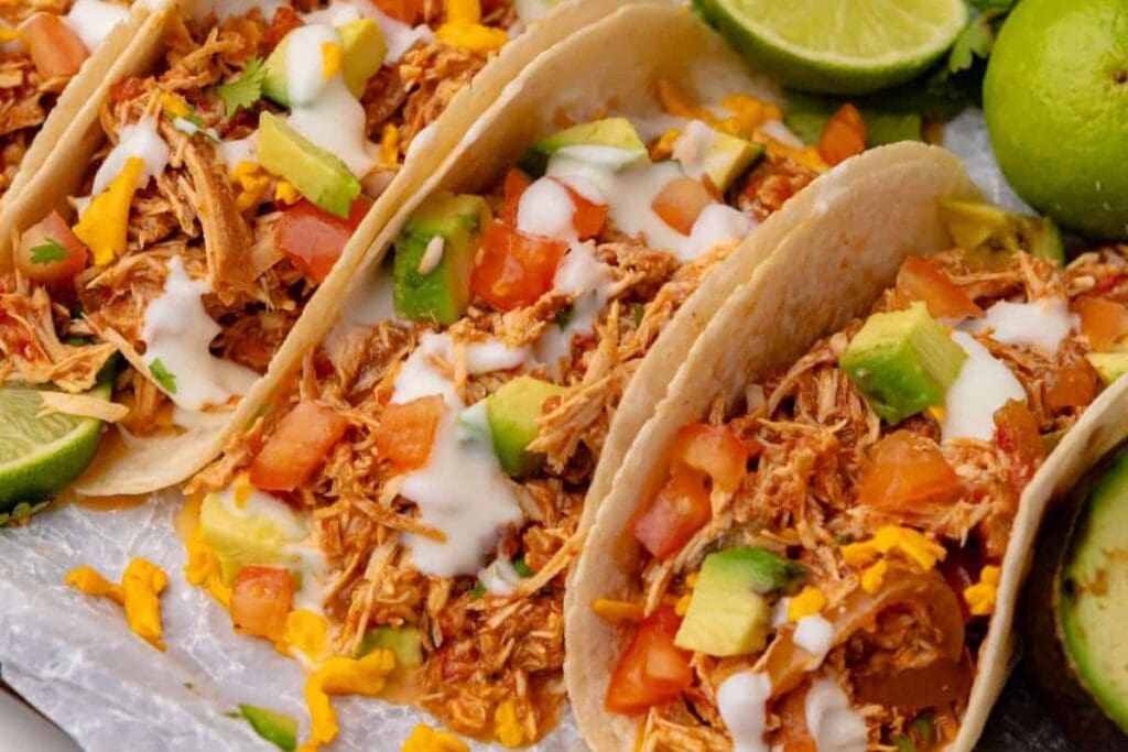 A close up shot of slow cooker chicken tacos.