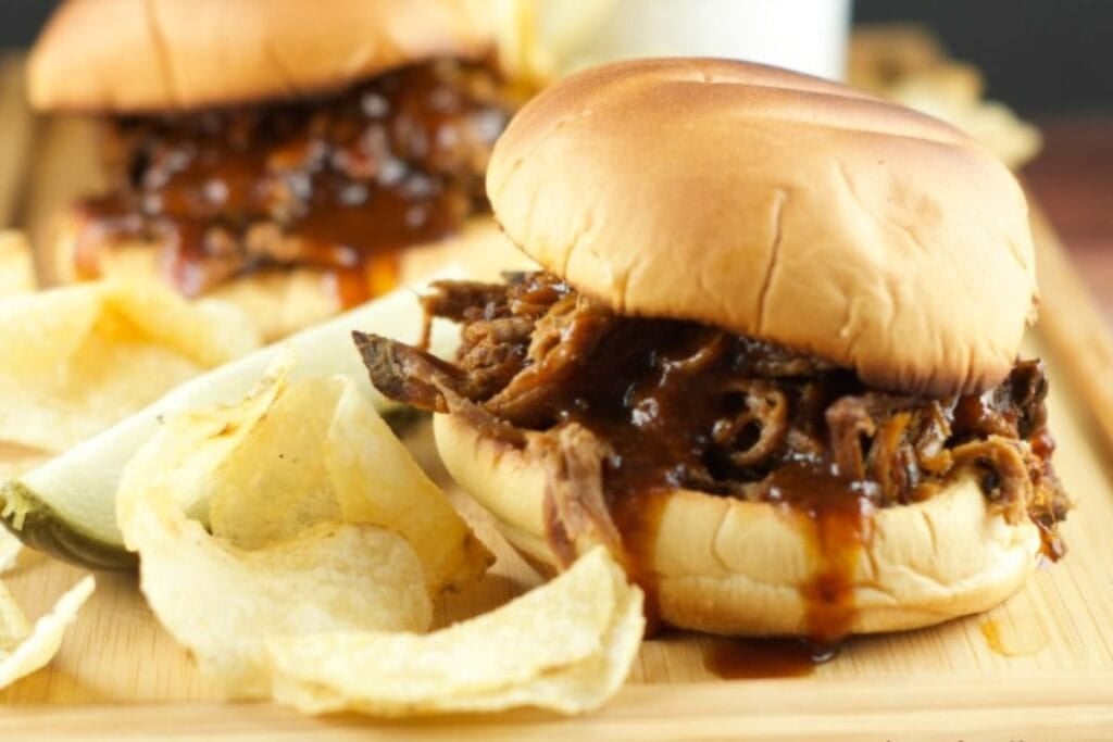 A close up shot of slow cooker pulled bbq beef.
