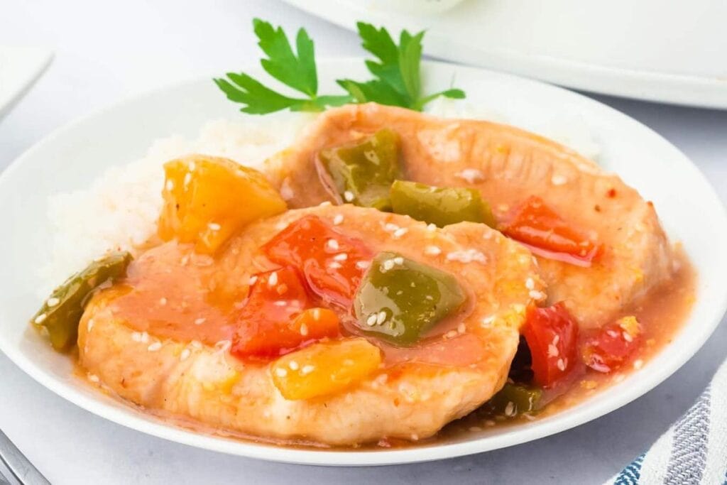 A close up shot of sweet and sour pork chops.