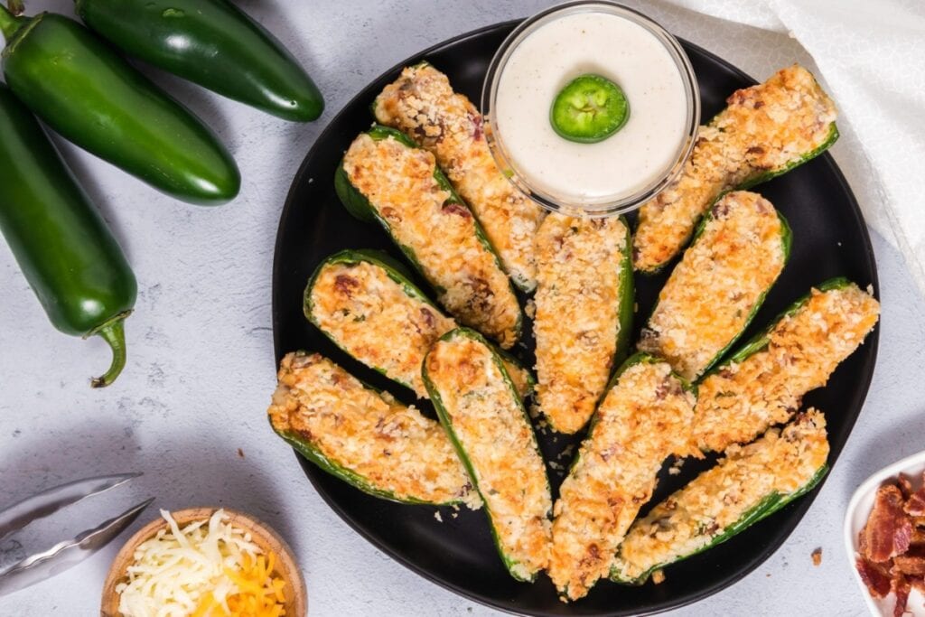 Air fryer jalape&ntilde;o poppers on a plate.