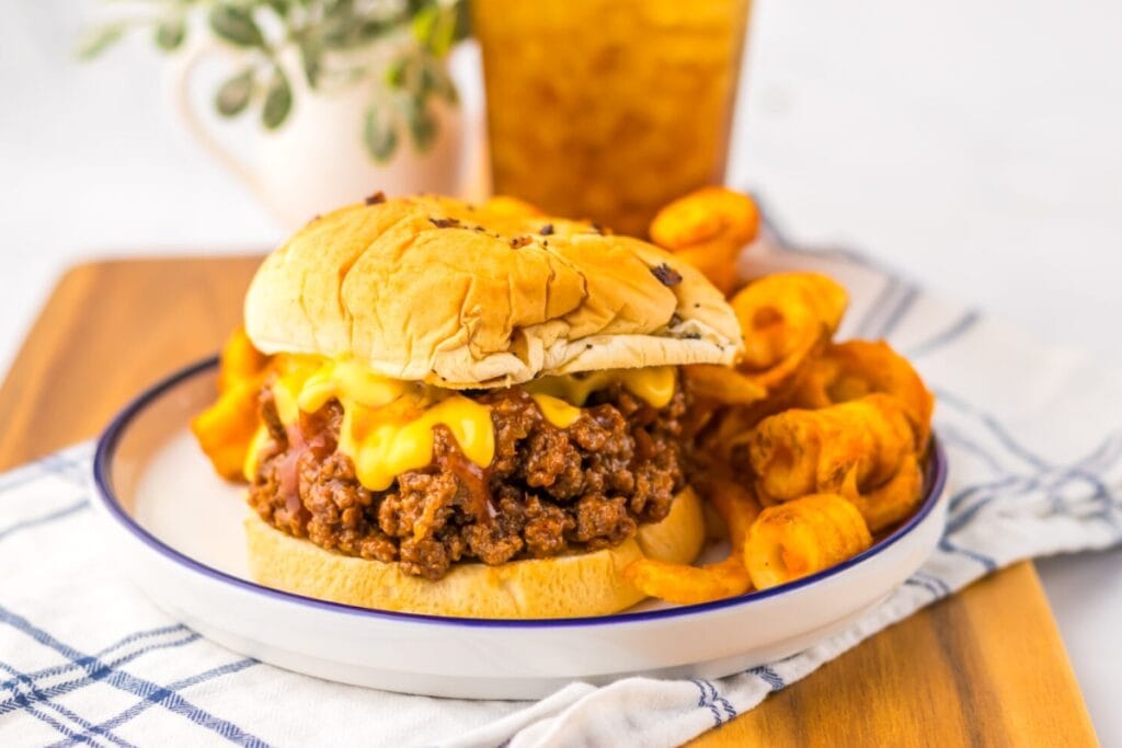 Arby’s beef and cheddar sloppy joes on a plate.