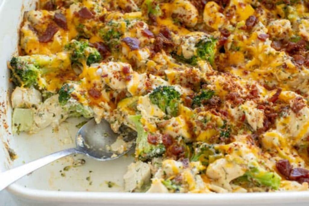 Bacon ranch chicken casserole in a glass baking dish.