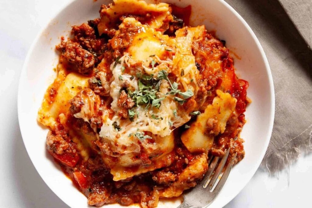 Baked ravioli casserole on a plate.