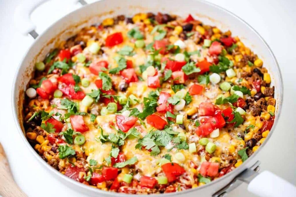 Burrito cooked in a skillet.