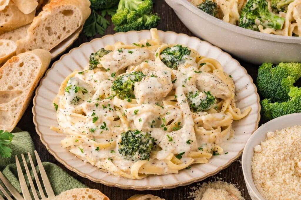 Chicken and broccoli Alfredo on a plate.