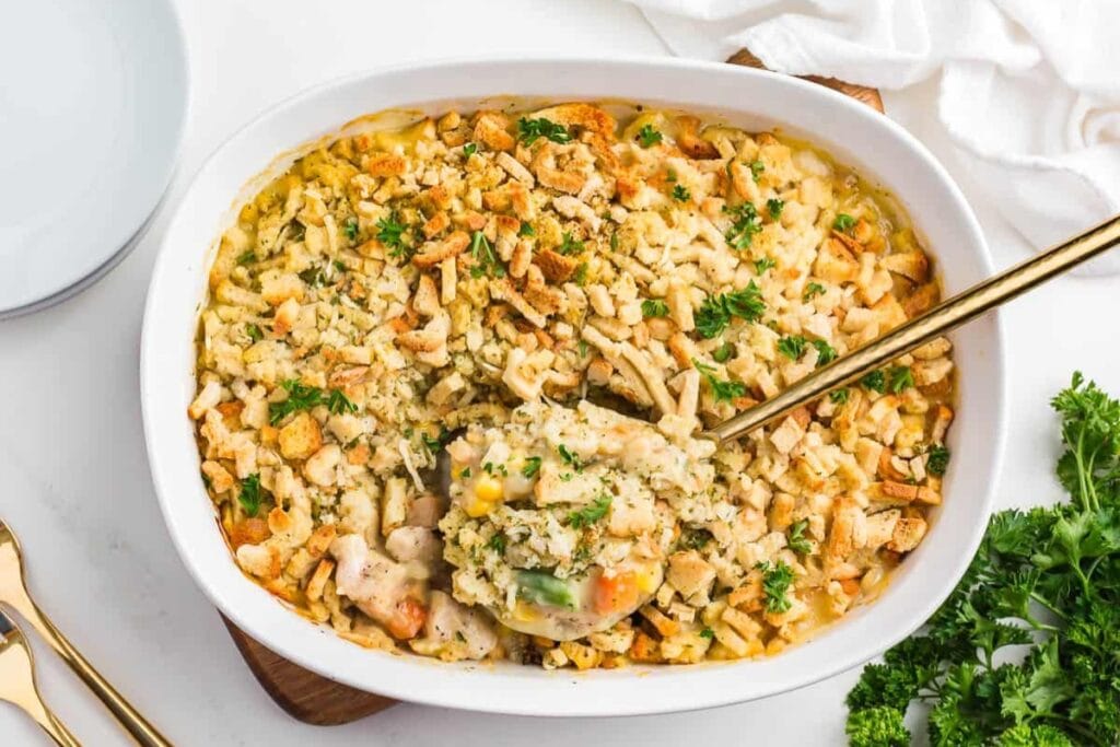 Chicken and stuffing casserole in a baking dish.