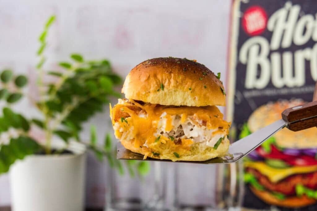 Chicken bacon ranch slider on a spatula.