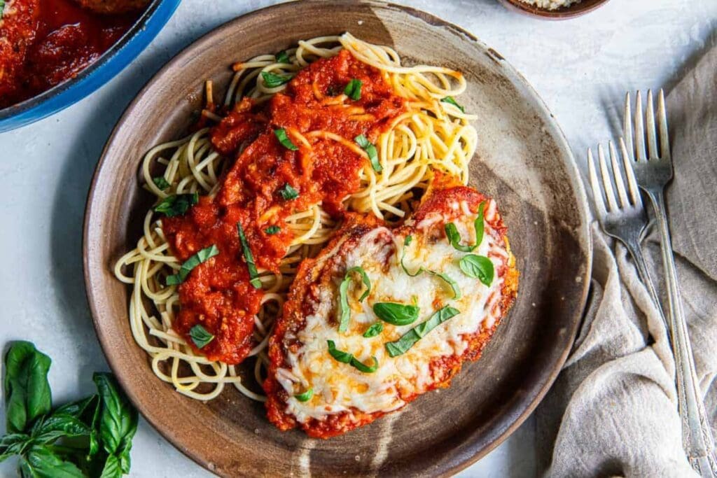 Chicken parmesan on a plate.
