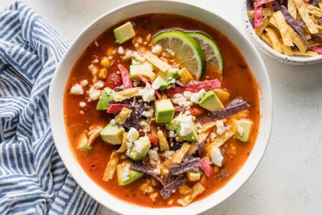 Chipotle chicken tortilla soup in a bowl.