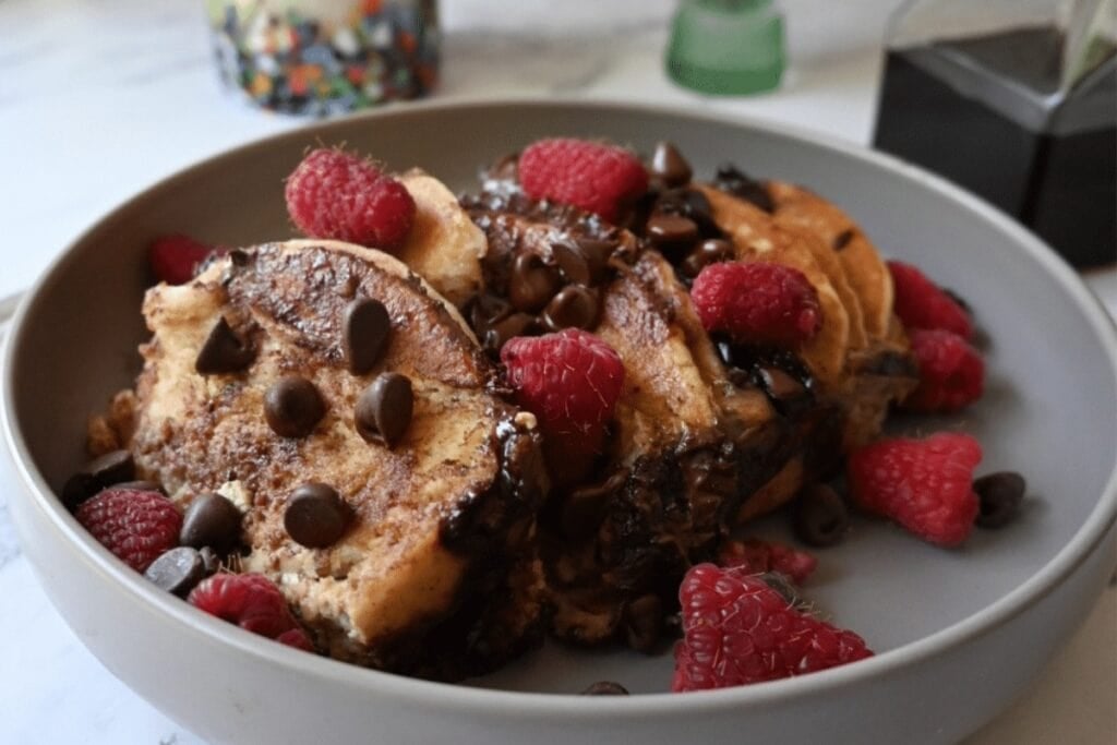 Chocolate chip pancake casserole on a plate.