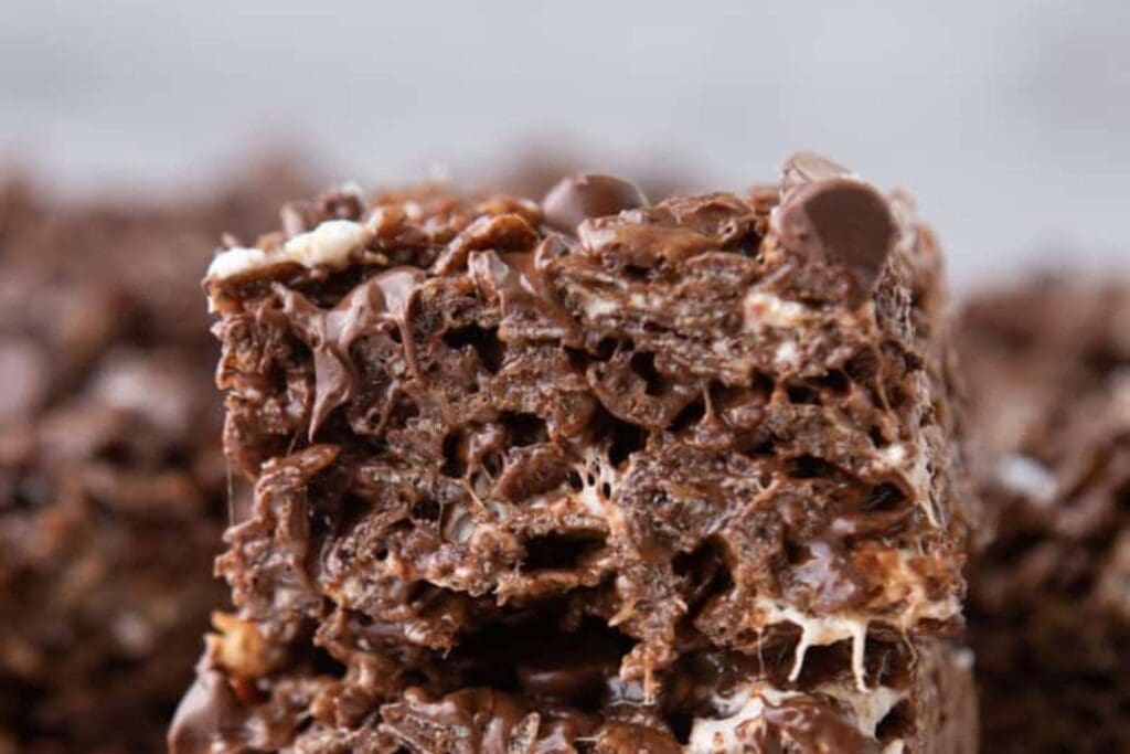 Chocolate Rice Krispies treats stacked close up.
