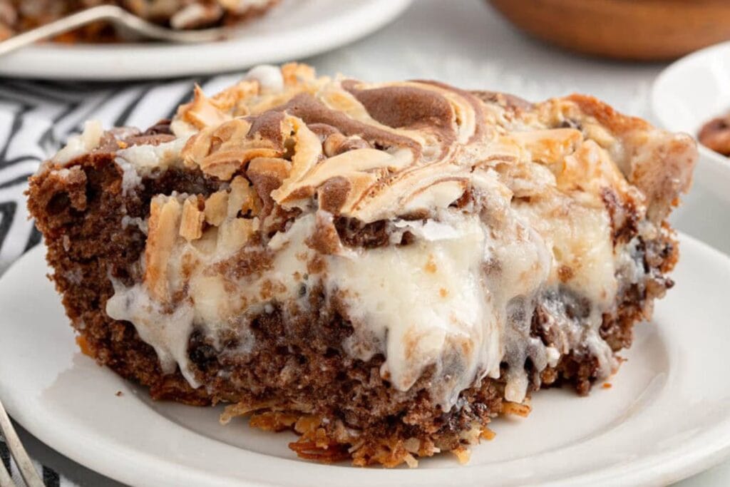 Slice of earthquake cake on a plate.