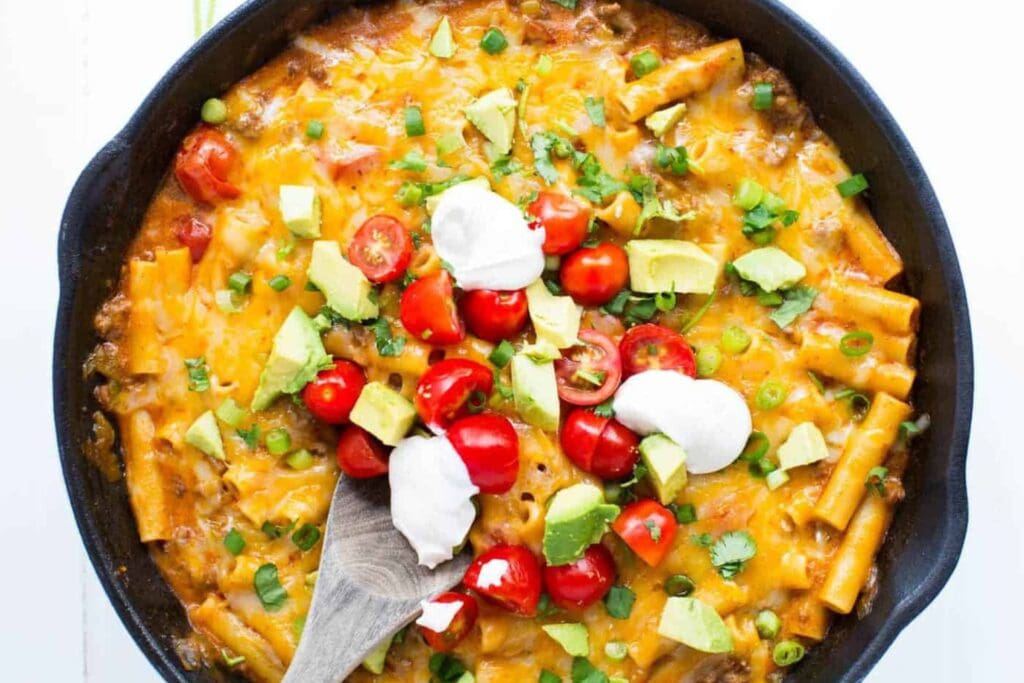 Enchilada pasta in a skillet.
