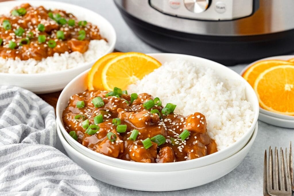 Instant Pot orange chicken on a plate.